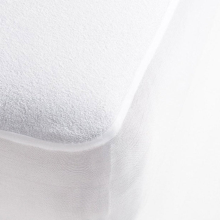 Brolly Sheets waterproof towelling mattress protector with soft texture and fitted design for added comfort.