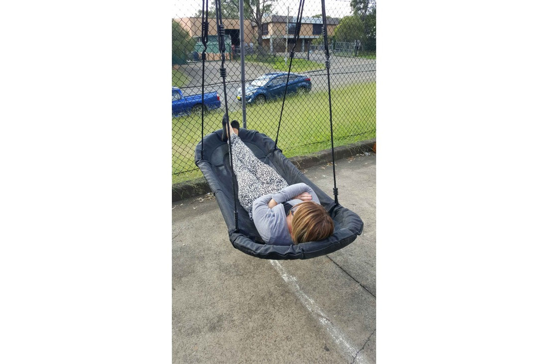 Black Nest Swing ‘GRANDOH’ with adjustable ropes, sensory play equipment designed for children, by Special Needs Play Equipment.