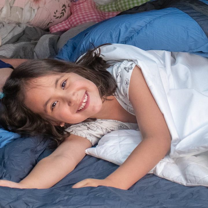 Cotton Brolly Sheets sleeping bag liner with waterproof Manchester fabric for kids, featuring a snug fit and soft, breathable material.